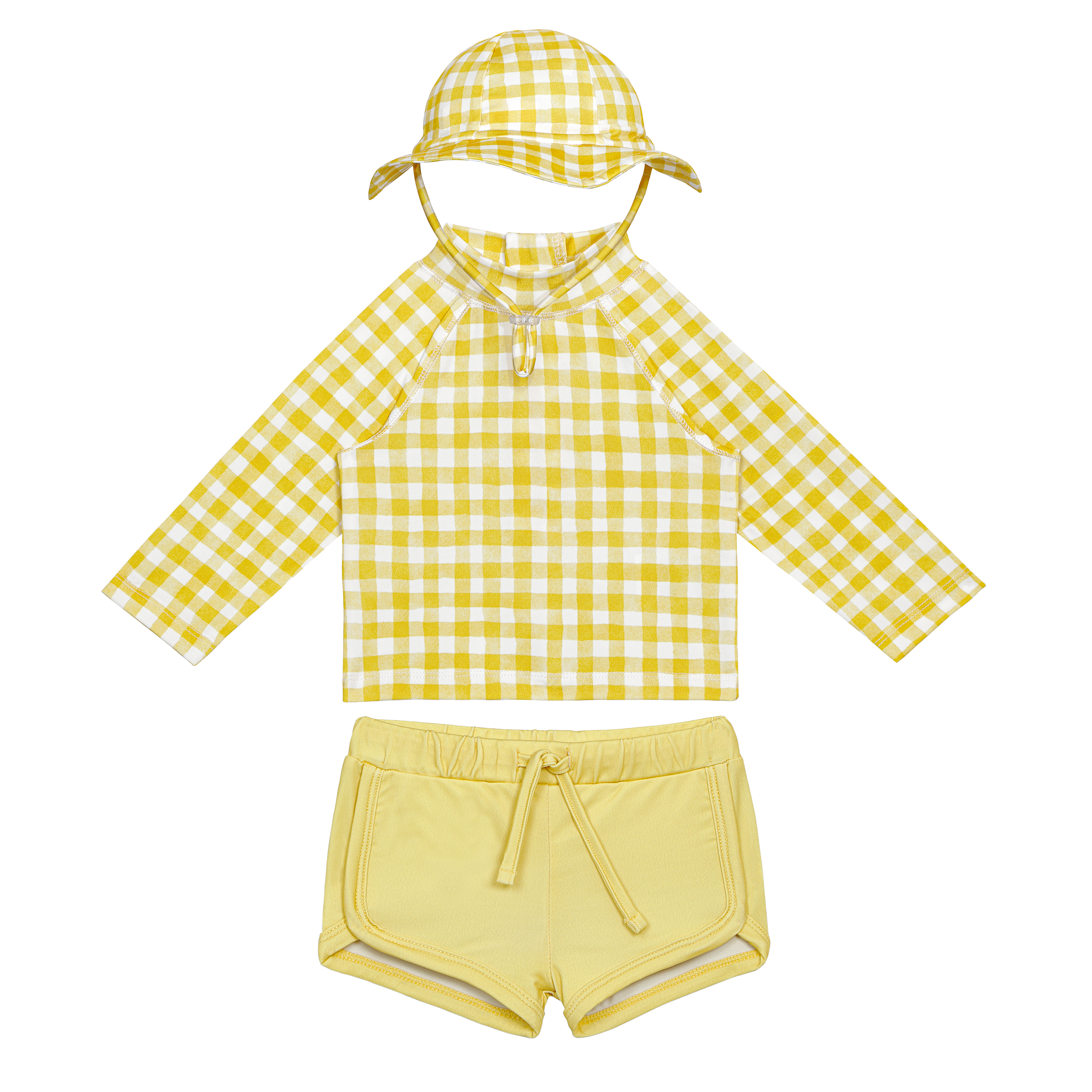 yellow checkered long-sleeve top, shorts, and a hat