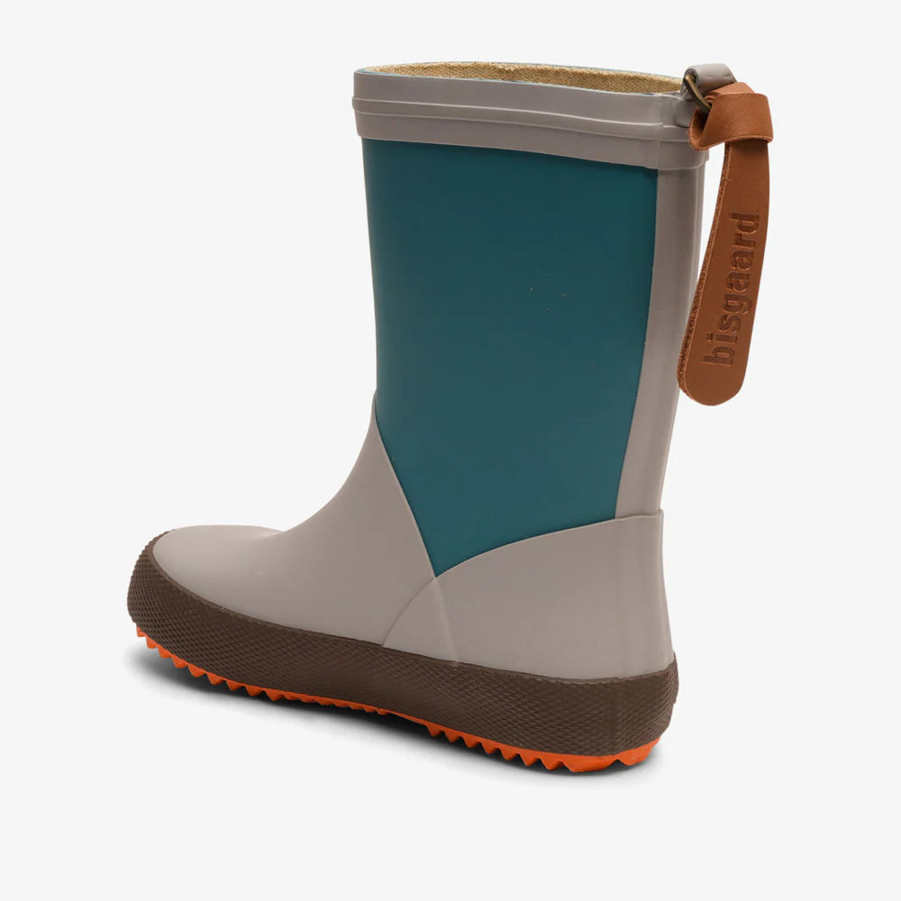 Blue and gray rain boot with orange sole on a white background