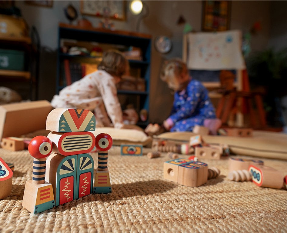 childrens playing with robots.