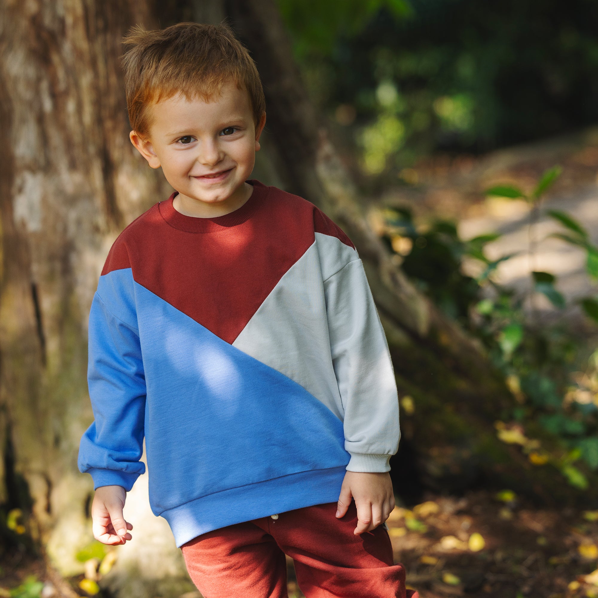 kid wearing grow diagonal long-sleeve sweatshirt