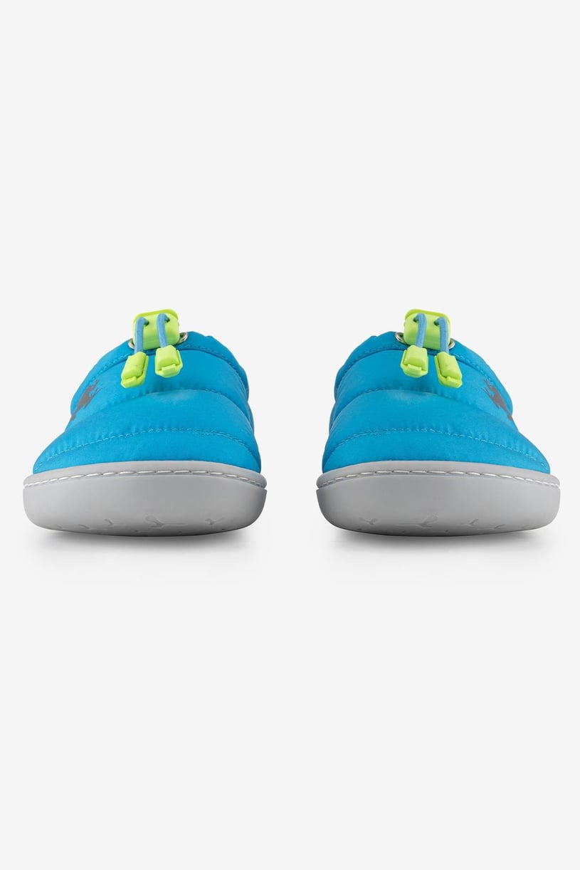 front view of a pair of blue casual kids barefoot shoes with green details.