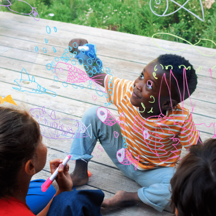 Children drawing with colorful markers