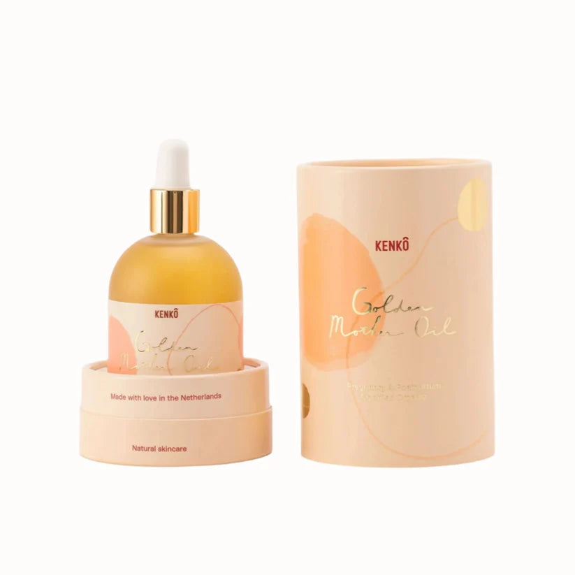 golden mother belly oil - pregnancy with container box against white background